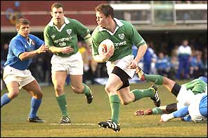 Ireland's Brian O'Driscoll runs in to bring the score to 30-10
