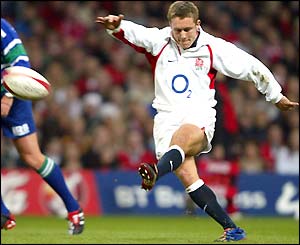 Jonny Wilkinson kicks a drop goal to extend England's lead
