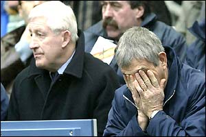 Scottish coach Ian McGeechan and Jim Telfer look in despair as Scotland lose
