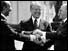 Sadat, Carter and Begin shake hands 