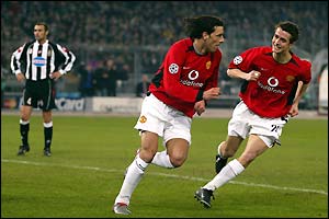 Ruud Van Nistelrooy celebrates with Daniel Pugh after scoring Manchester United's third 
