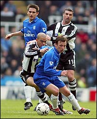 Newcastle's Kieron Dyer tussles with Chelsea's Jody Morris