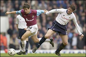 West Ham's Joe Cole evades Darren Anderton's tackle