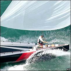 Dean Phipps, bowman of Swiss team Alinghi, secures the forestay 