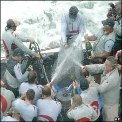 Champagne is opened on board Alinghi