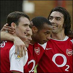 Arsenal's Robert Pires celebrates his goal with Francis Jeffers and Thierry Henry 