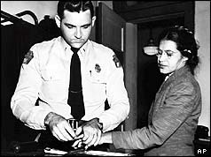 Rosa Parks being fingerprinted after her arrest
