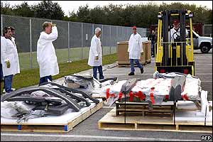 Shuttle debris being unloaded