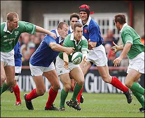 Kevin Maggs of Ireland tries to break down the French defence