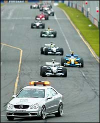 The safety car controls the race after Rubens Barrichello's crash
