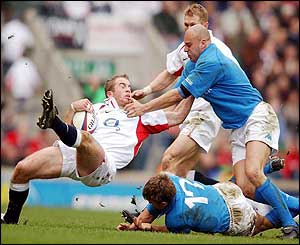 James Simpson-Daniel is tackled by Mauro Bergamasco