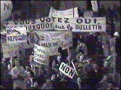 Protesters carrying banners