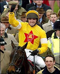 Ruby Walsh on Azertyuiop celebrates after winning the Irish Independent Arkle Trophy 