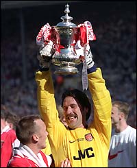 David Seaman holds aloft the FA Cup in 1998
