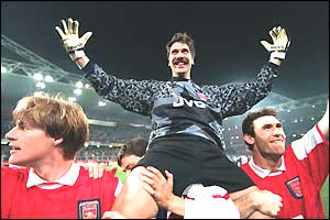 Stefan Schwarz and Martin Keown hoist David Seaman aloft after his penalty saves in the semi-final shoot-out against Sampdoria