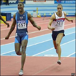 Justin Gatlin claims the men's 60m crown