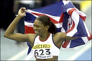 Ashia Hansen proudly waves the British flag