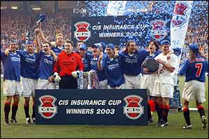 Rangers players celebrate retaining the CIS Cup