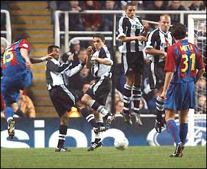 Fabio Rochemback's free-kick heads towards the Newcastle wall 