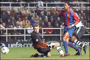 Newcastle keeper Shay Given is beaten as Patrick Kluivert puts the ball past him into the net
