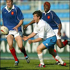 Italian fly-half Ramiro Pez starts a move amongst the backs