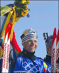 Ole Einar Bjoerndalen celebrates one of his gold medals at Salt Lake City