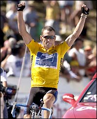Lance Armstrong celebrates his Tour de France victory in 2002