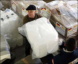 As coalition forces push northwards in Iraq aid is readied in the German port of Hamburg