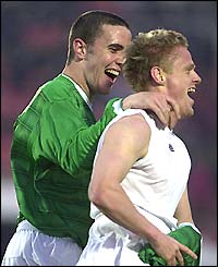 John O'Shea and Damien Duff celebrate taking the lead after Duff's third international goal