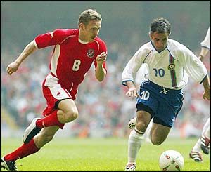 Craig Bellamy puts the Azerbaijan defence under pressure in a one-sided first half 