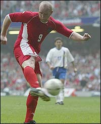 John Hartson scores Wales third goal just before half-time