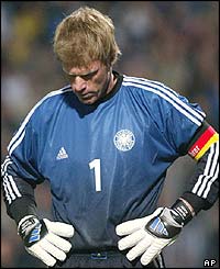 Germany's goalkeeper Oliver Kahn looks at the ground after his side's 1-1 draw with Lithuania
