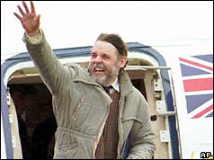 Terry Waite arriving at RAF Lyneham airbase in the UK