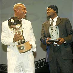 El Hadji Diouf is joined by Senegal team-mate Tony Sylva who claims the Goalkeeper of the Year prize