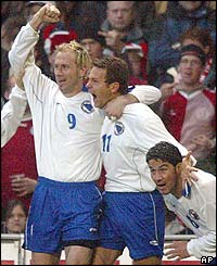 Sergej Barbarez, Bosnia's first goalscorer, and Elvir Baljic, their second, celebrate a surprise victory against Denmark