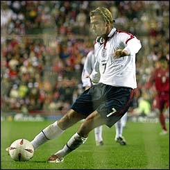 England captain David Beckham strikes a penalty in injury-time