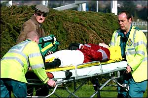 Gordon Elliot is stretchered away