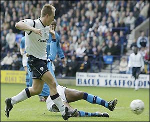Henrik Pedersen scores the opener for Bolton