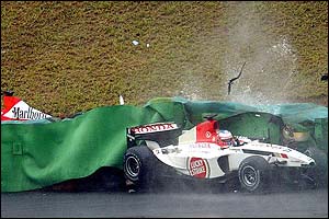 Jenson Button crashes out of the race in the 33rd lap