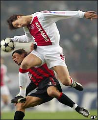 Ajax's Zlatan Ibrahimovic and AC Milan's Paolo Maldini battle for the ball 
