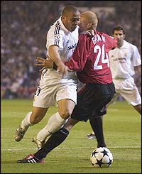 Manchester United's Wes Brown tackle Ronaldo