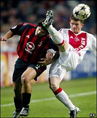 Gennaro Gattuso (left) tackles Ajax midfielder John O'Brien