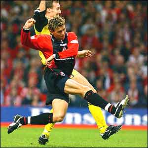 Stephen Purches fires in Bournemouth's third goal