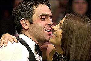 Ronnie O'Sullivan enjoys a congratulatory kiss