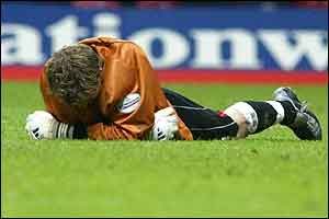 Lincoln goalkeeper Alan Marriott is devastated after Bournemouth score their fourth goal