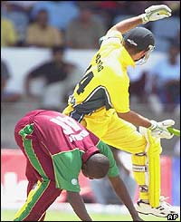 West Indies bowler Ryan Hurley collides with Australia's Ricky Ponting 