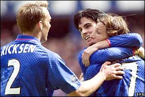 Rangers players celebrates Claudio Caniggia's goal