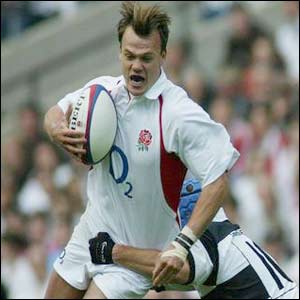 Christophers is tackled by David Humphreys at Twickenham