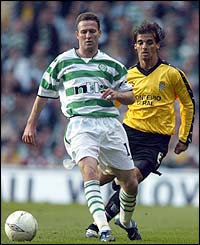Celtic captain Paul Lambert brings the ball forward