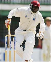 Ridley Jacobs reaches his half-century, despite batting injured